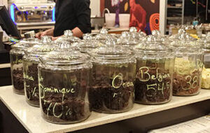 Image showing different jars filled with different types of chocolate pellets