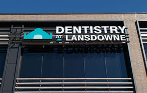 Image showing the the Dentistry at Lansdowne logo outside on the side of thebuilding at TD Place