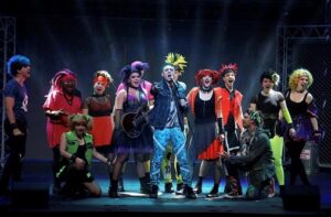 Image of the cast of We Will Rock You Musical on stage at TD Place