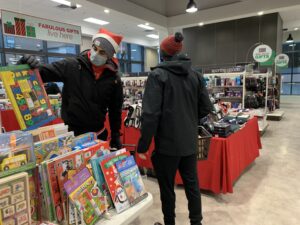 Image of 67's players shopping for toys for Christmas